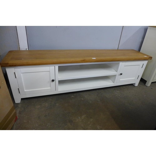 1403 - A Hampshire cream painted oak extra large TV unit * this lot is subject to VAT