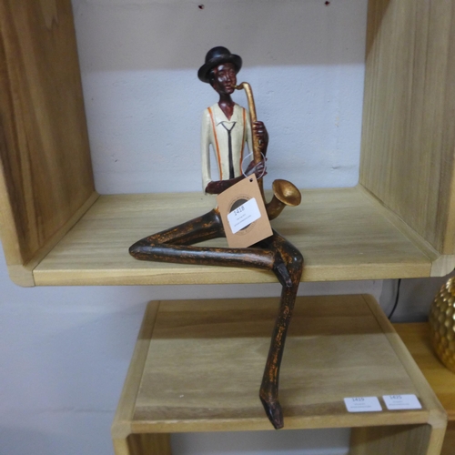 1411 - A sitting jazz band saxophonist, 38cms (026011)   #