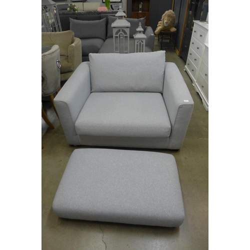 1418 - A grey upholstered snuggle chair and footstool