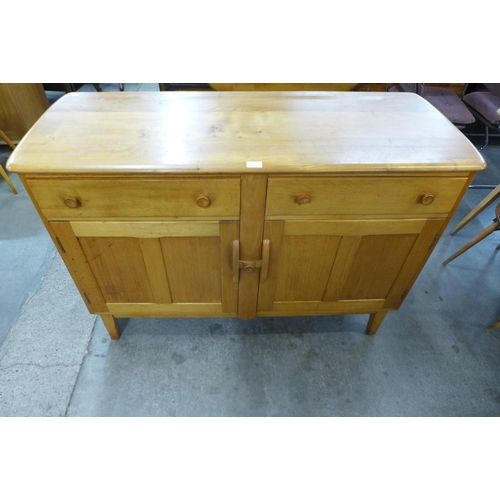 102 - An Ercol Blonde elm and beech sideboard