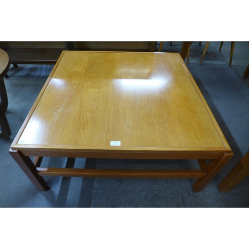 111 - A teak square coffee table