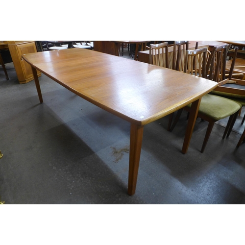 112 - A Danish teak extending dining table