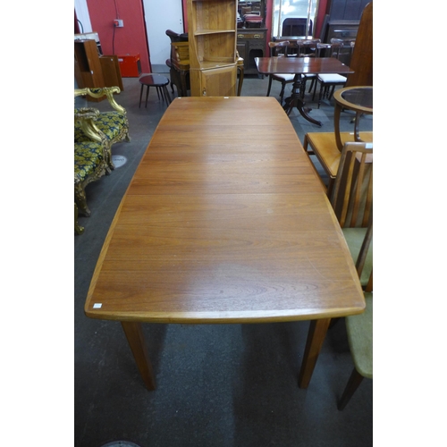 112 - A Danish teak extending dining table