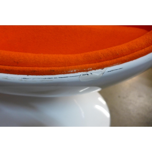 114 - An Eero Aarnio style white laminate and orange fabric ball chair