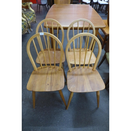 118 - A set of four Ercol Blonde elm and beech Windsor chairs