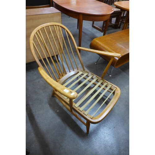 119 - An Ercol Blonde beech Windsor armchair