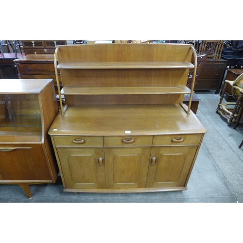 127 - A Priory oak sideboard