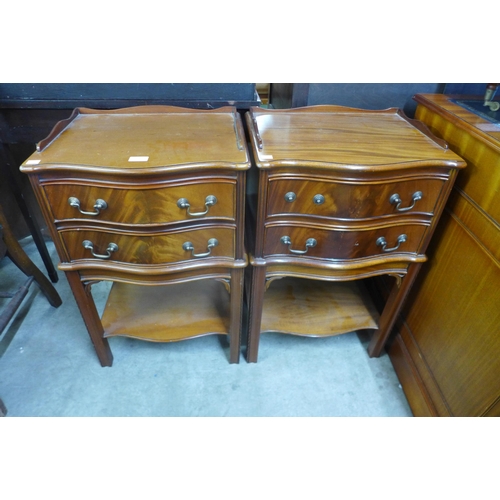 177 - A pair of mahogany serpentine two drawer night stands