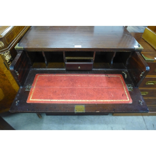 204 - A campaign style mahogany and brass mounted secretaire chest of drawers