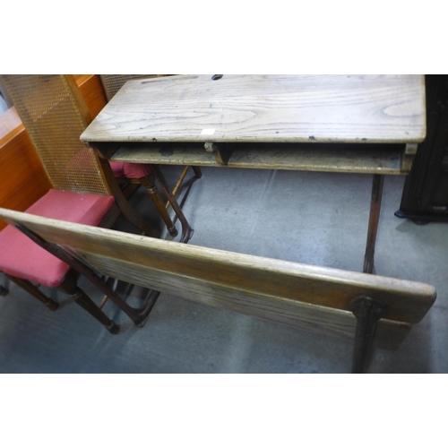 216 - A child's steel and elm double school desk