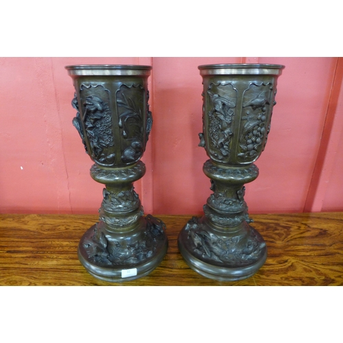 22 - A pair of Japanese Meiji period bronze vases