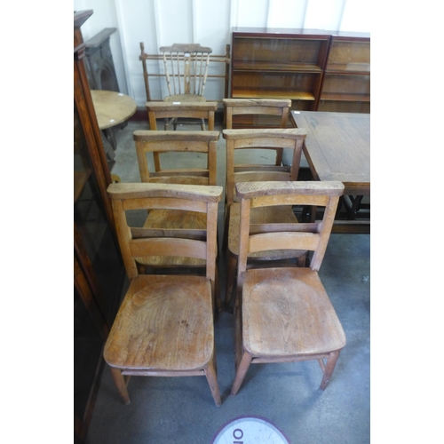 237 - A set of six elm and beech chapel chairs