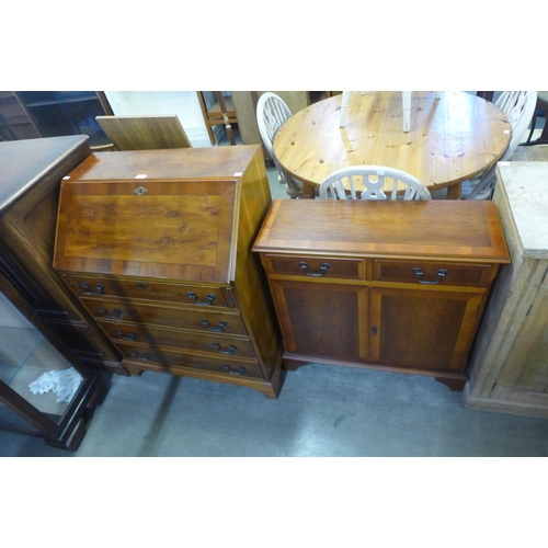 242 - A yew wood bureau and side cabinet