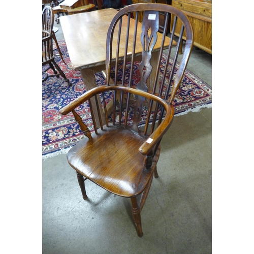 29 - A 19th Century elm and beech Windsor highback armchair