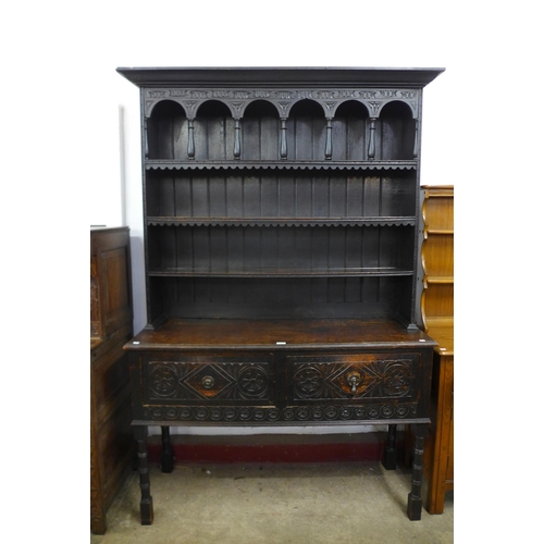 3 - A Victorian Jacobean Revival carved oak dresser