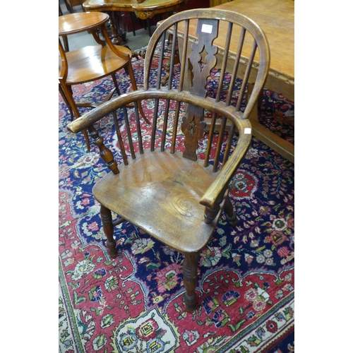 30 - A 19th Century elm Windsor armchair