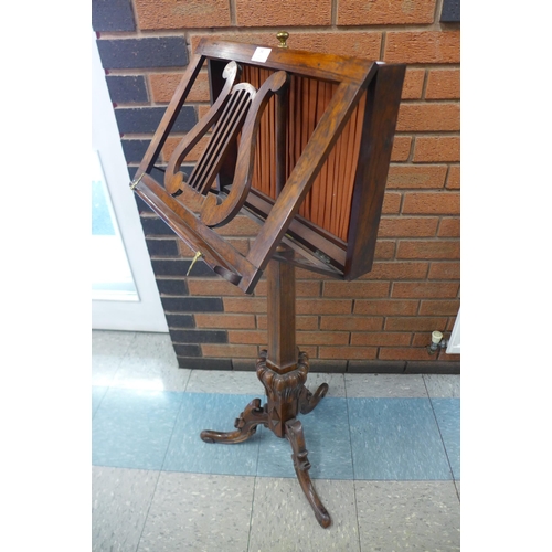 34 - An early Victorian rosewood music stand