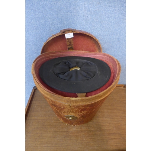 359 - Two Victorian top hat, in a leather box