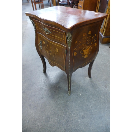 36 - A French Louis XV style inlaid mahogany and gilt metal mounted bombe shaped petit commode