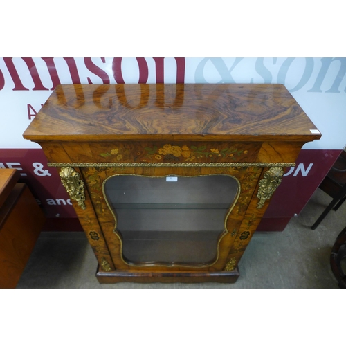 39 - A Victorian walnut and marquetry inlaid pier cabinet