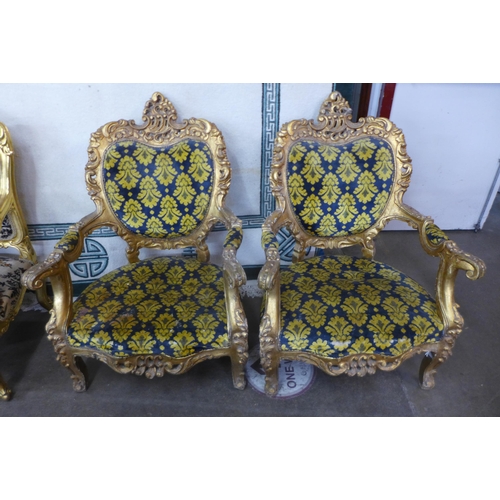 56 - A pair of French Louis XV style giltwood and fabric upholstered fauteuils