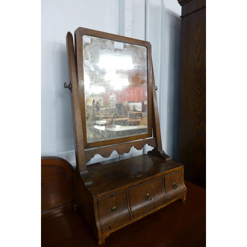 7 - A George I walnut three drawer toilet mirror and a George III mahogany framed mirror