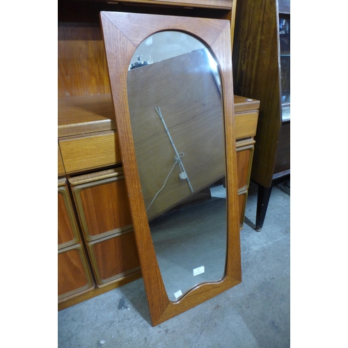 74 - A teak framed mirror