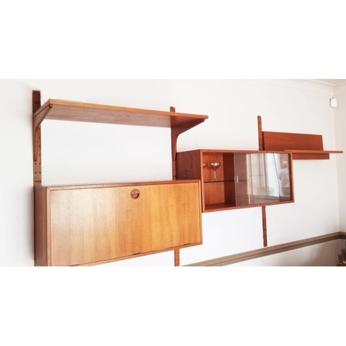 77 - A Danish H.G. Furniture teak floating modular shelving sysyem