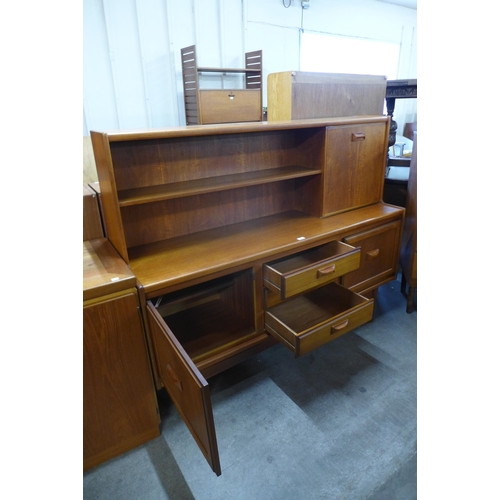 80 - A teak highboard