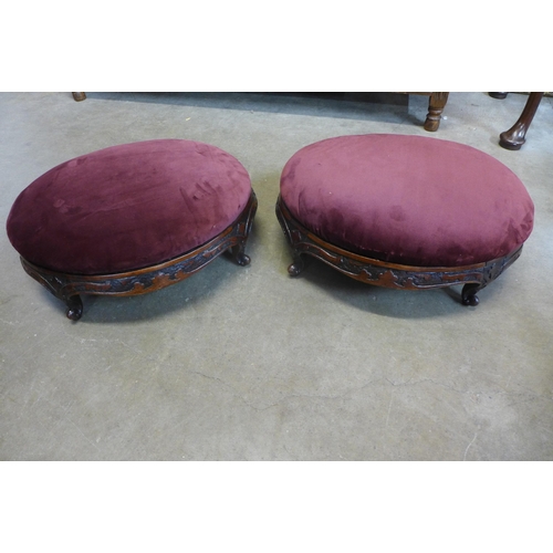 9 - A pair of Victorian carved walnut footstools