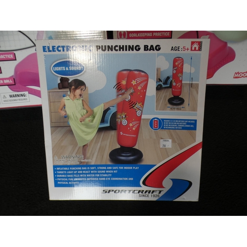 3078 - 4 Kid's swingball sets and a child's electronic punching bag * This item is subject to VAT