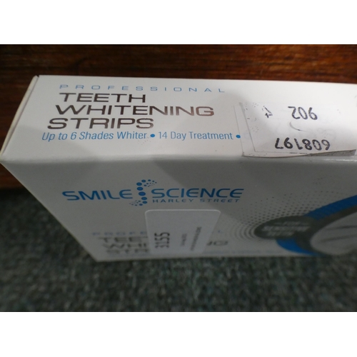 3155 - A Pack of Smile Science Strips and an Osprey Lady's Leather Purse (231-9, 27/902) * This lot is subj... 