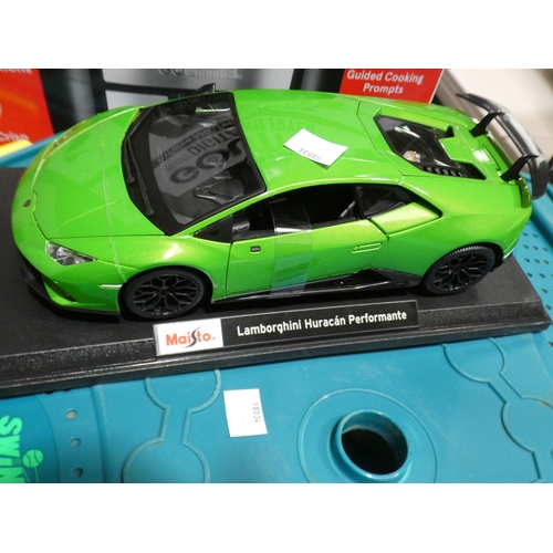 3234 - Swingball All Surface Pro and Maisto 1:18 scale, model Car (232-31, 125) * This lot is subject to VA... 