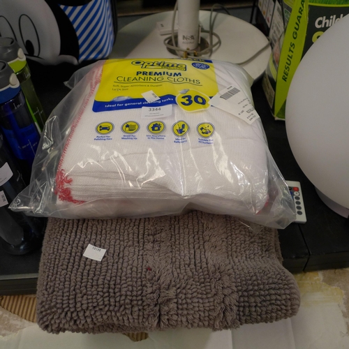 3344 - Kirkland Signature Organic Bath Mat and Optima Cleaning Cloths (232-239, 244) * This lot is subject ... 