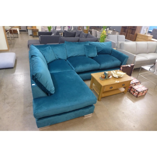 1301 - A teal blue designer corner sofa