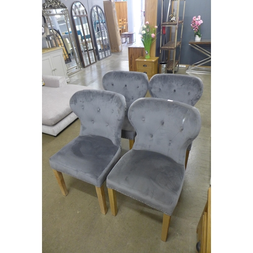 1351 - A set of four Arlo Grey chairs Tear to Fabric