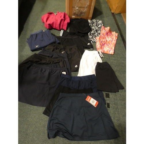 3046 - Quantity of lady's sportswear:- netball skirts, shorts, leggings etc. * This item is subject to VAT