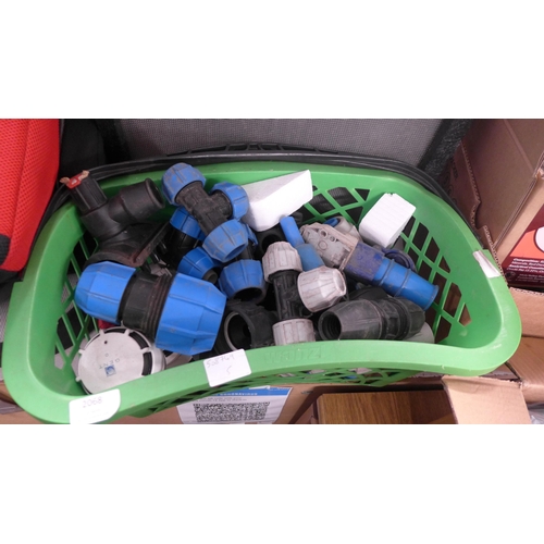 2068 - A basket of assorted hosepipe and vinyl pipe connectors