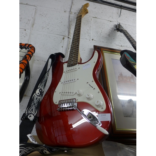 2102 - High gloss red Fender Squire Strat electric guitar