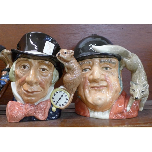 602 - Four large Royal Doulton character jugs, The Guardsman, Rip Van Winkle, Mad Hatter and Gone Away