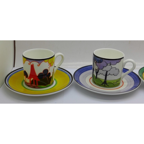 617 - Eight Wedgwood Clarice Cliff Cafe Chic coffee cups with saucers, boxed and with certificates