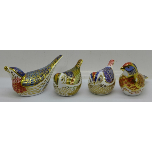 643 - Four Royal Crown Derby paperweights, 'Linnet' designed by Tien Manh Dinh and modelled by Mark Deif, ... 