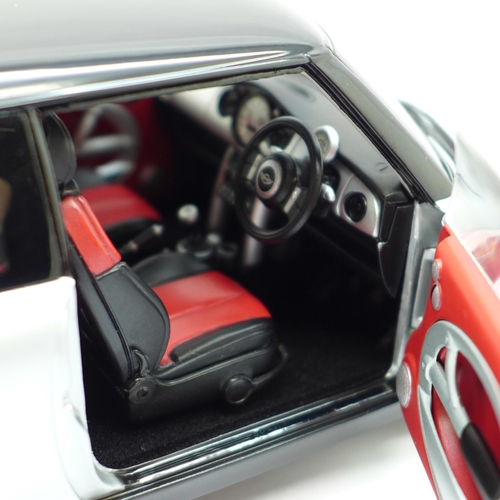 650 - A Kyosho 1:18 scale Mini Cooper model vehicle