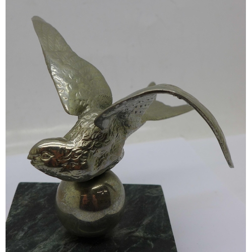 659 - A Bluebird car mascot mounted on a marble base, inscription Bluebird 1930