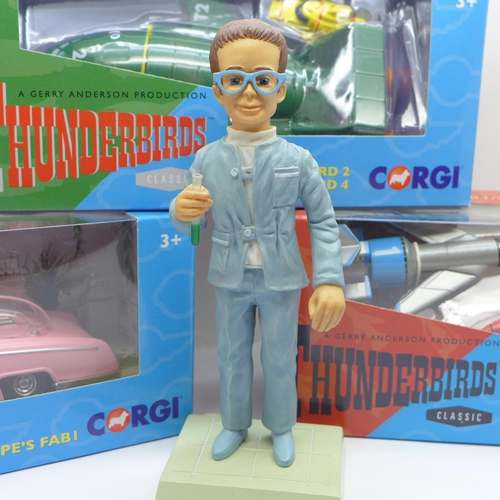 661 - Three Thunderbirds Corgi model vehicles, Thunderbird 1/3 and 2/4, boxed and a Robert Harrop Brains f... 