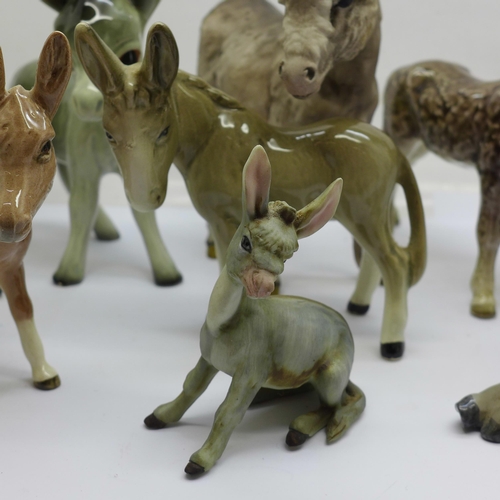 705 - Eight models of donkeys, Goebel x2, Beswick, Kaiser, etc., a/f