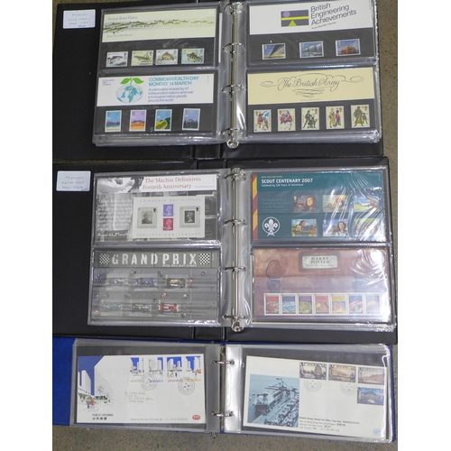 708 - A collection of approximately 130 Royal Mail mint stamp packs and a collection of First Day Covers