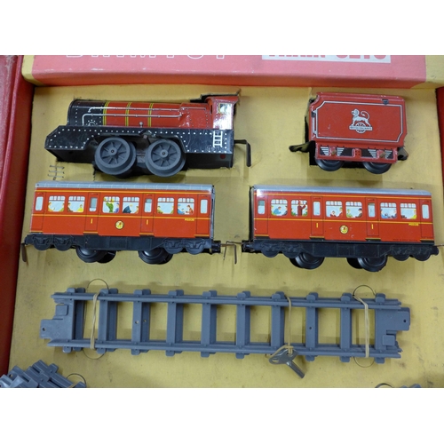 717 - A Brimtoy clockwork tin-plate O gauge train set, boxed