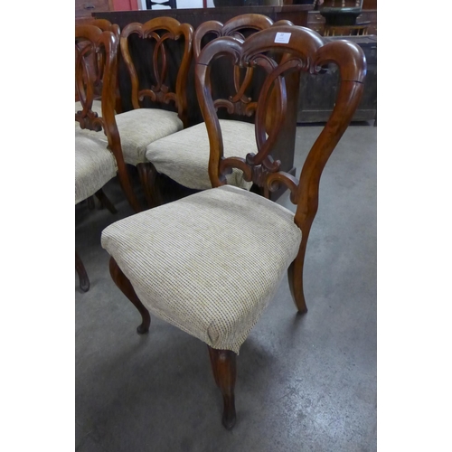 10 - A set of six Victorian walnut balloon back dining chairs