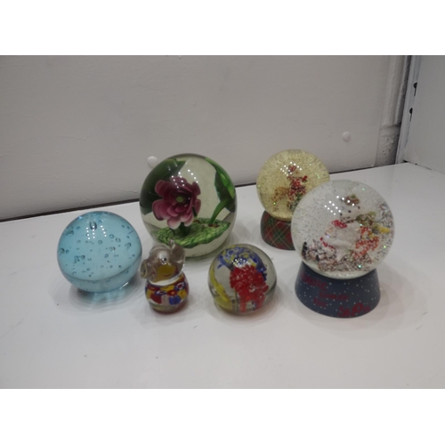 2094 - Box of glass paperweights & snow globes